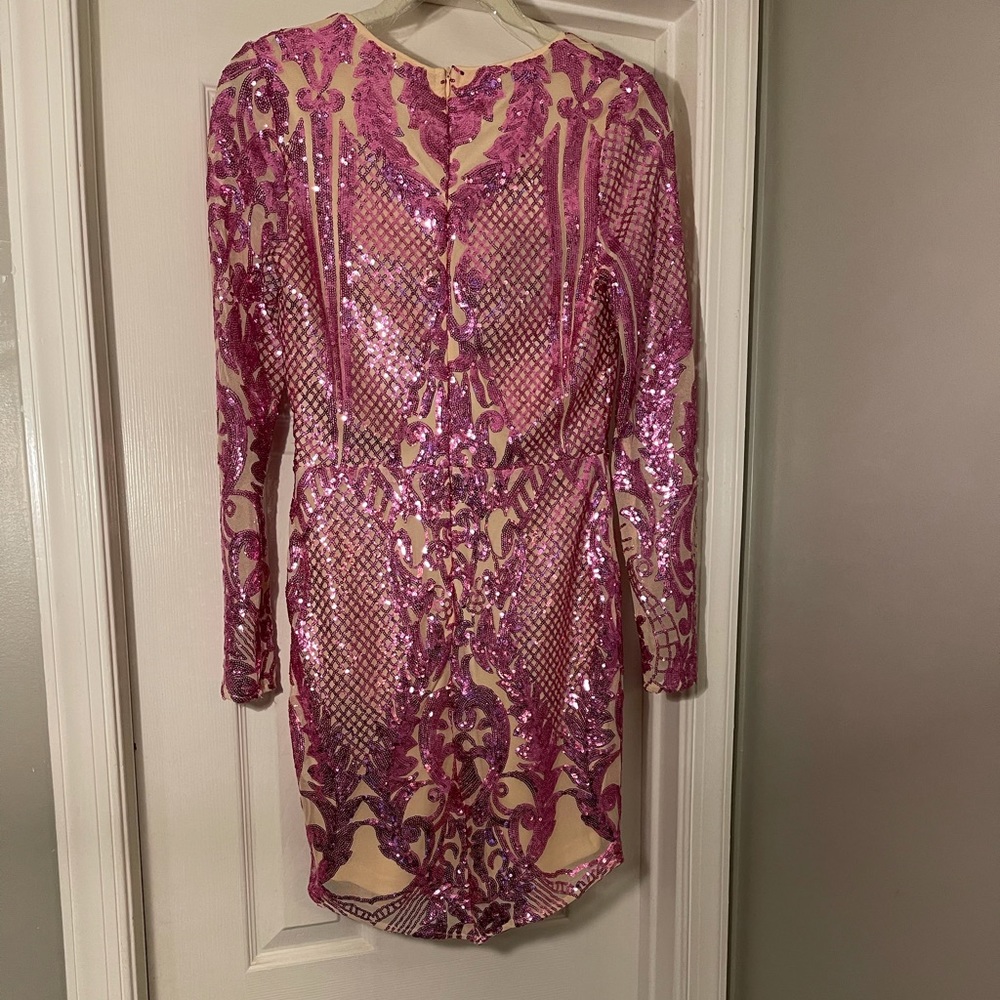 Pink fire long sleeve sequin dress. Fun for girls night out.